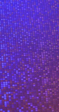 Dense sparkling sequins in vibrant colors tones, smooth rotation in seamless loop. Ideal for fashion, party and glamour backgrounds.