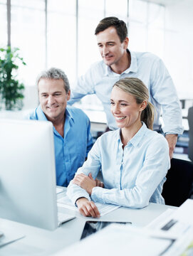Business people, meeting and happy with computer in office, digital info analysis and project. Technology, research and colleagues with team strategy for online proposal review or check report