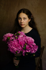 girl with pink peonies © Iryna Shkryabinets