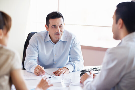 Team, meeting and documents with business people in office for planning, account review or research. Budget report, project advisor and paperwork with employees in agency for treasury feedback