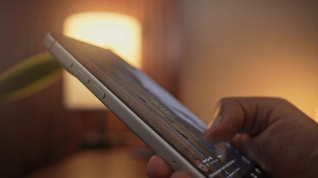Close-up of a hand scrolling through a social media feed on a smartphone, depicting digital addiction, mindless browsing, and screen dependency in daily life and prolonged scrolling.