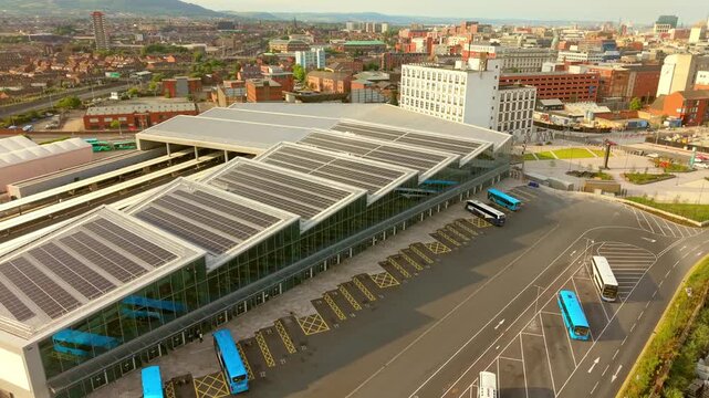 Clockwise 4K 60FPS aerial video of Grand Central Station in Belfast, Northern Ireland in the UK. Produced in broadcast ready Rec709 color.