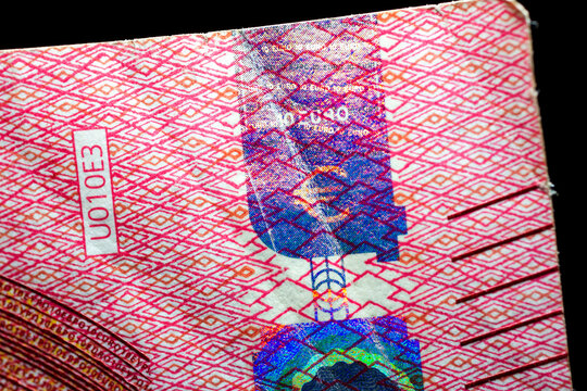 Euro currency extreme close up of 10 euro banknote. Detailed European money texture. Selective focus. Shallow depth of field. Extreme macro.