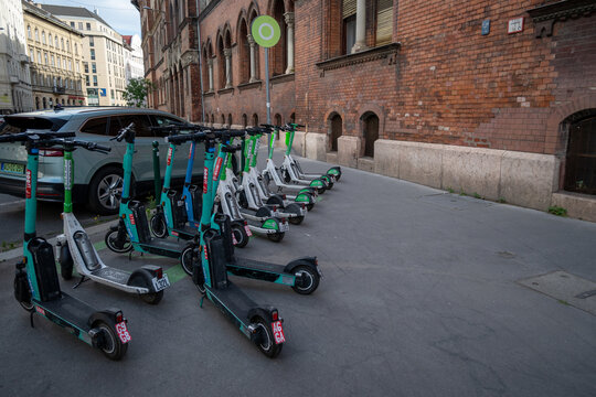 Shared Electric Scooters Parked on a Sidewalk in Budapest Hungary