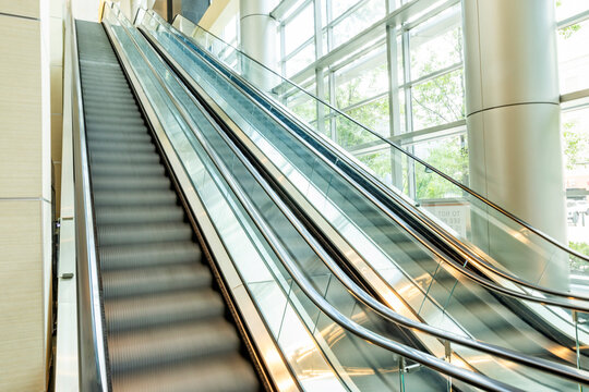 Empty escalators in modern building