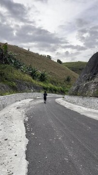Man Running on Rural Road