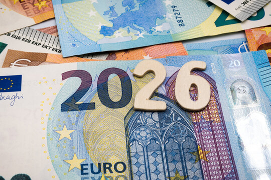 Euro currency, banknotes, and the inscription "Year 2026".
