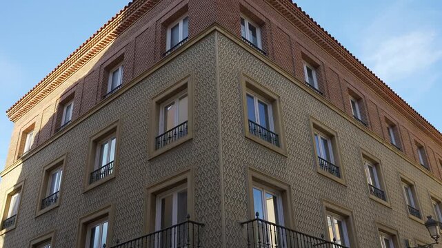 Decorated sgraffito facade on a traditional residential building in the historic center of Segovia Spain