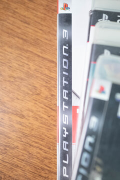 Playstation 3 Sony  logo on used playstation game box, copy space background image physical game, market collectors, second hand