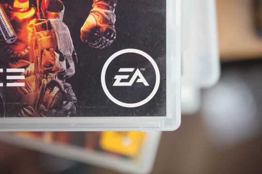 EA game developer logo on used playstation game box, copy space background image physical game, market collectors, second hand