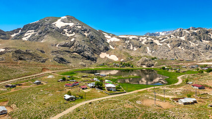 Fototapeta premium Lake Eğri which is 130 km from Alanya and 40 km from Gündoğmuş, is located at an altitude of 2100 meters on the eastern slope of Geyik Mountain at the Taurus Mountains.. If you are going from Seydişeh