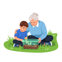 Grandmother and Grandson Looking at Earthworms