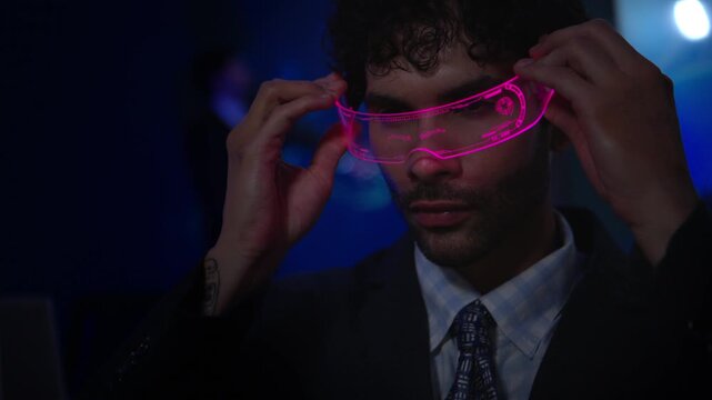 Business executive wearing smart glasses analyzing digital dashboards and business intelligence metrics in a modern office, demonstrating AI powered analytics and data driven decision making