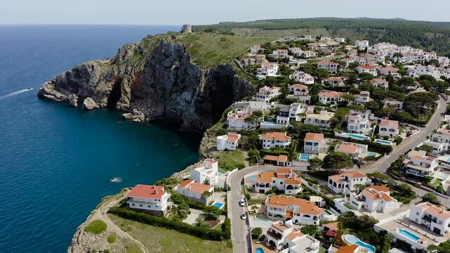 Aerial View of medieval watchtower of Cala Montgo, Anchorage and Turquoise Waters, Costa Brava, Spain. 