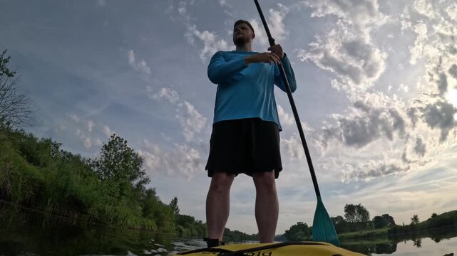 Man paddling SUP on Miedzybrodzkie Lake