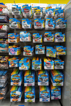 Hot Wheels car toy collections. A retail display case featuring Hot Wheels die-cast toy cars in a toy store. Hot Wheels is a brand product of Mattel. Minsk, Belarus - June 10, 2026