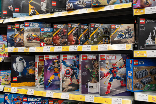 Boxes of Lego Star Wars, Marvel and other franchise sets displayed on supermarket shelves. Minsk, Belarus - June 10, 2026