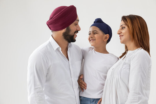 A SIKH PARENTS AND CHILD SPENDING TIME TOGETHER