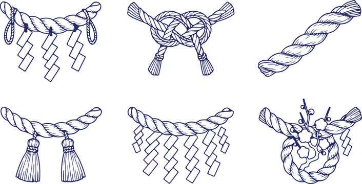 Traditional Japanese sacred rope shimenawa with zig zag paper streamers shide and decorative knots and tassels for shrine decoration.