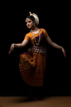 Odissi dancer performing Devdasi pose