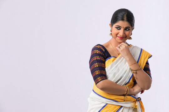 Mohiniattam dancer remembering a pleasing incident through Mushti mudra 