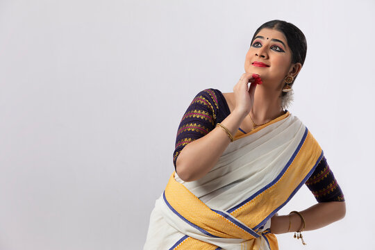 Indian classical dancer looking in amazement with Mushti mudra
