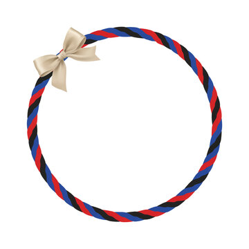 Circular border frame composed of multi-colored twisted ropes finished with a decorative light tan bow circular decorative isolated colorful ornament