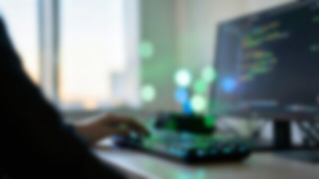 Abstract Blurred Software Developer Workspace for Tech Website