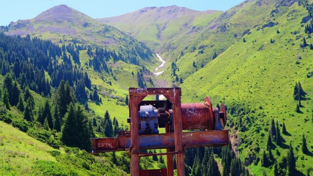Old soviet union cableway transmission left behind to rust on the mountains of Almaty