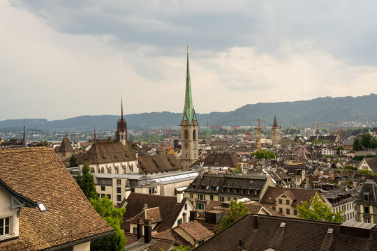 Scenic city skyline of Zurich from ETH Zurich university terrace under summer sky, Switzerland