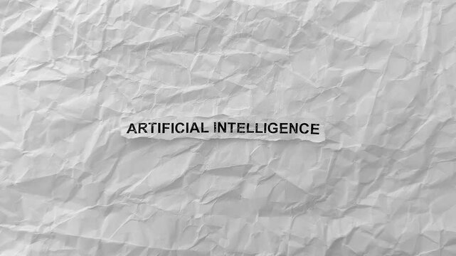 Crumpled piece of paper with words Artificial Intelligence on torn crumpled white paper pieces background. Zoom in.