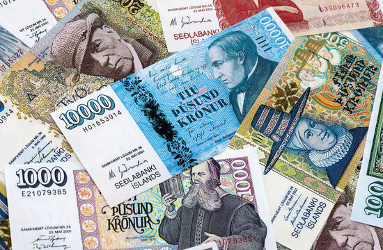 Icelandic krona money banknotes pile on table. Iceland bills of ISK currency. Concept of economy