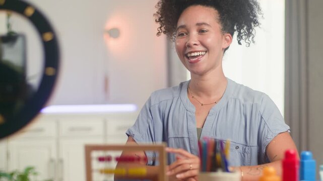 Engaging Online Teacher: Black Woman with Natural Hair Instructs English and Math Remotely