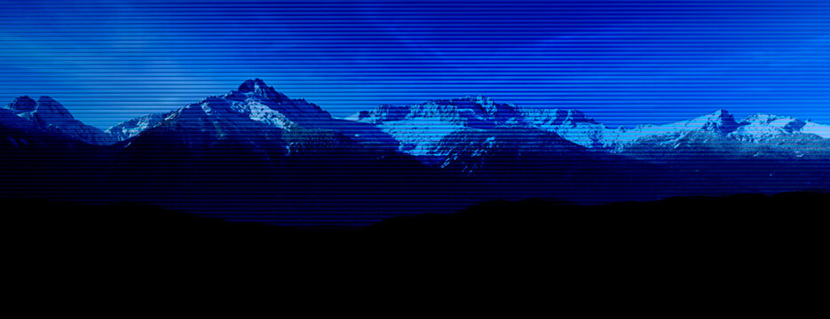 Digital glitch effect over blue mountain range landscape