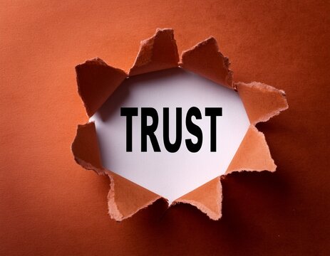 torn paper with word trust broken trust concept and emotional damage