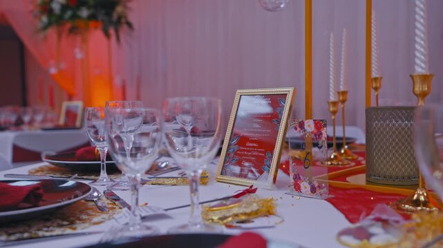 Elegant Wedding Reception Table with Printed Menu and Candle Holders