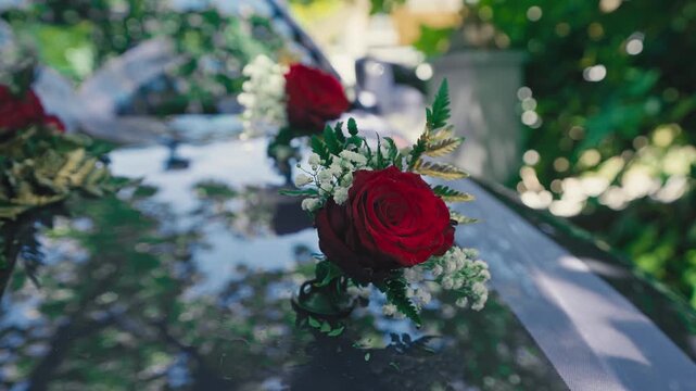 Close Up of Wedding Car Hood Decorated with Red Roses