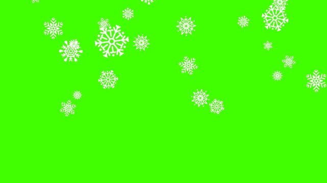 Festive animation of gold glitter snowflakes falling down against a green screen background