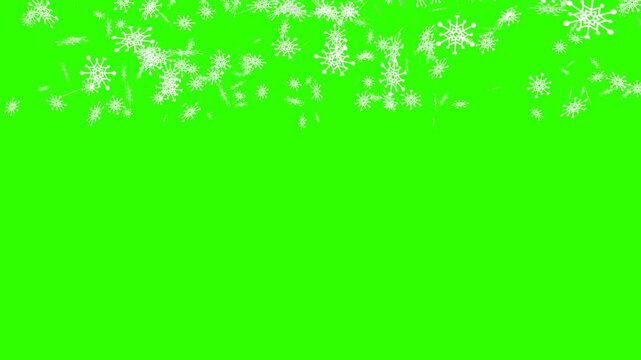 Festive animation of gold glitter snowflakes falling down against a green screen background