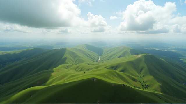 Drone shot of rolling green hills under dramatic white clouds with clean composition and generous negative space for text placement