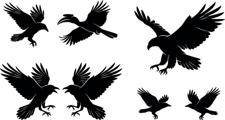 Flying Predator Birds Silhouette Vector Set Featuring Eagle Raven Hornbill and Crow Illustrations for Heraldic Logos Badges Gothic Icons and Tattoo Graphic Designs © Rtazmina
