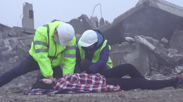 Rescue Workers Performing CPR Chest Compressions