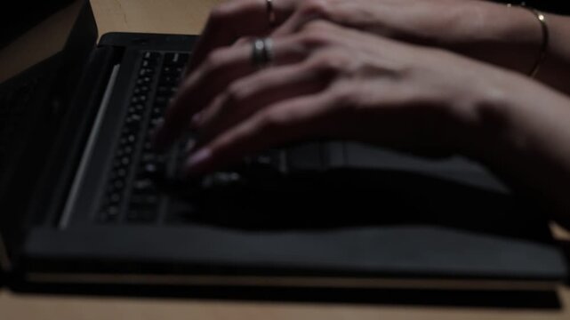 Businesswoman Typing on Laptop in Modern Office Close Up