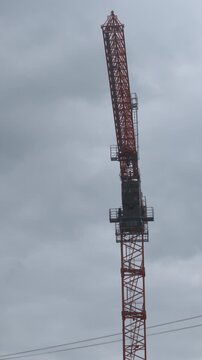 Construction crane boom arm rotates