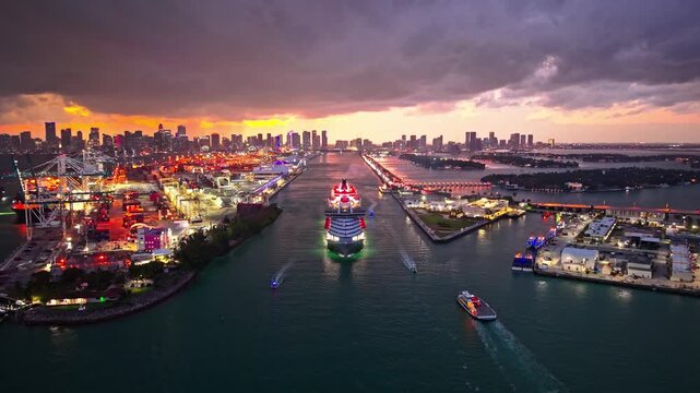 cruise ship voyage at night. cruise line. Cruise ship tour and travel at sea. Cruise ship leaving Miami illuminated port.