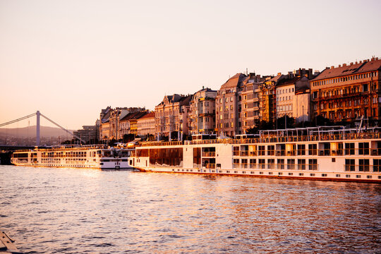 View of Pest waterfront at sunset in Budapest, Hungary.