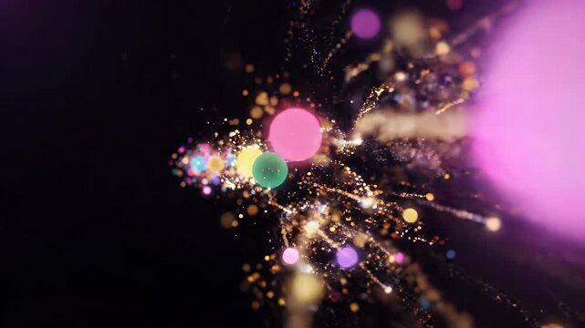 Colorful Particles Burst Motion Background - A vibrant explosion of colorful circles and particles erupts from a bright central light against a dark background.