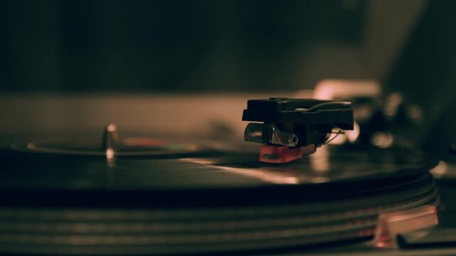 4k high resolution stock video, Close Up of DJ Turntable Playing Vinyl Record with Needle on Retro Audio Mixer for Music Entertainment and Club Party Sound Concept