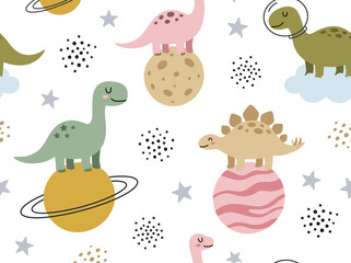 Seamless nursery pattern of cute cartoon dinosaurs on planets in space. © Archii