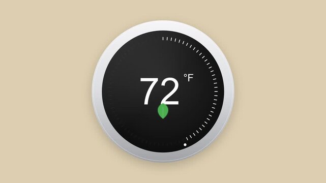 Modern smart digital thermostat showing 72 degrees Fahrenheit with energy efficiency leaf icon on beige background.